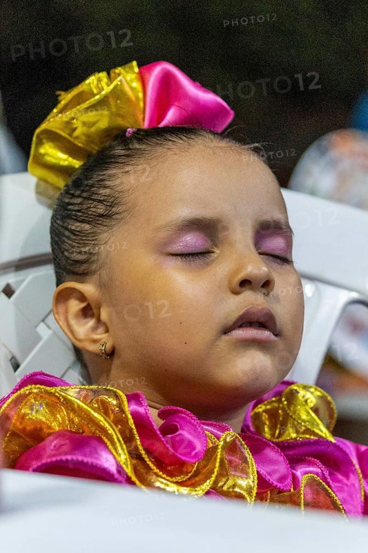 Little girl in folklore dress sleeping
