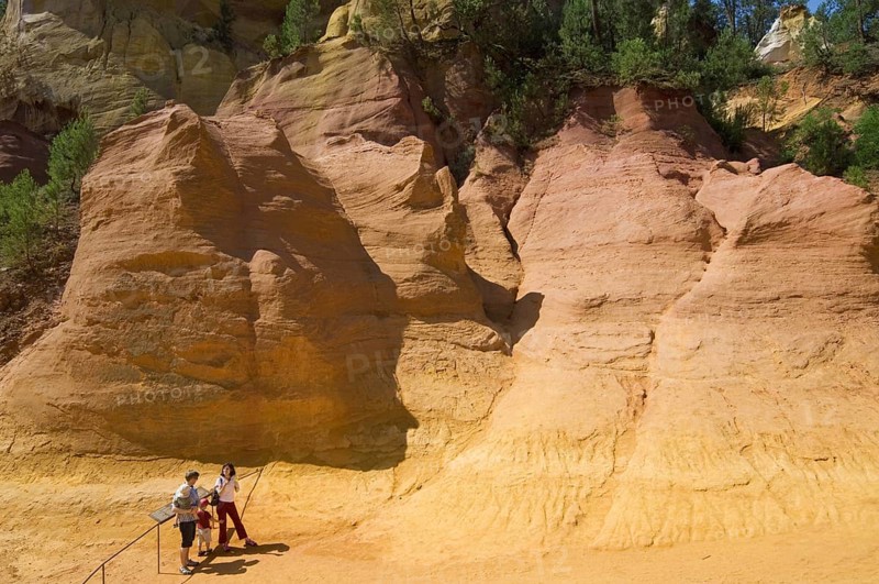 Tourists visiting the old ochre quarry at Roussillon