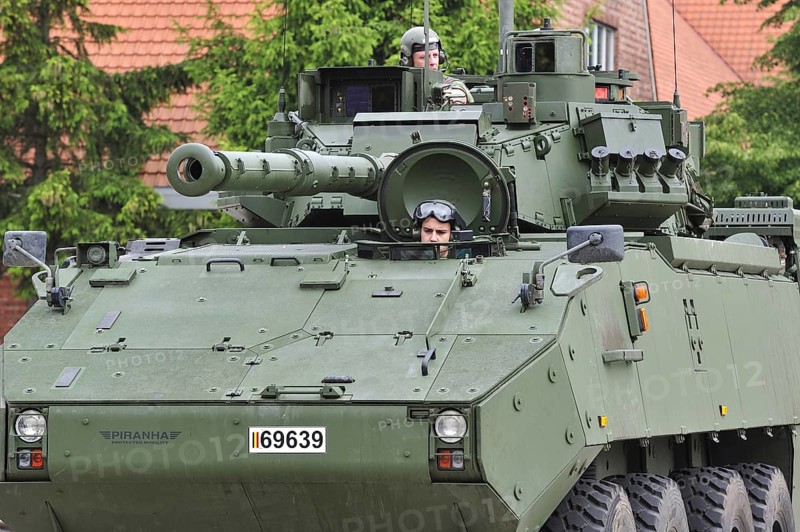 Driver and commander in turret of MOWAG Piranha IIIC armoured fighting vehicle of the Belgian army