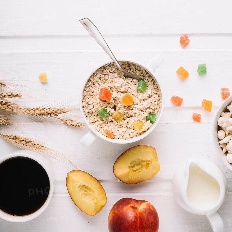 Healthy breakfast with oatmeal white table