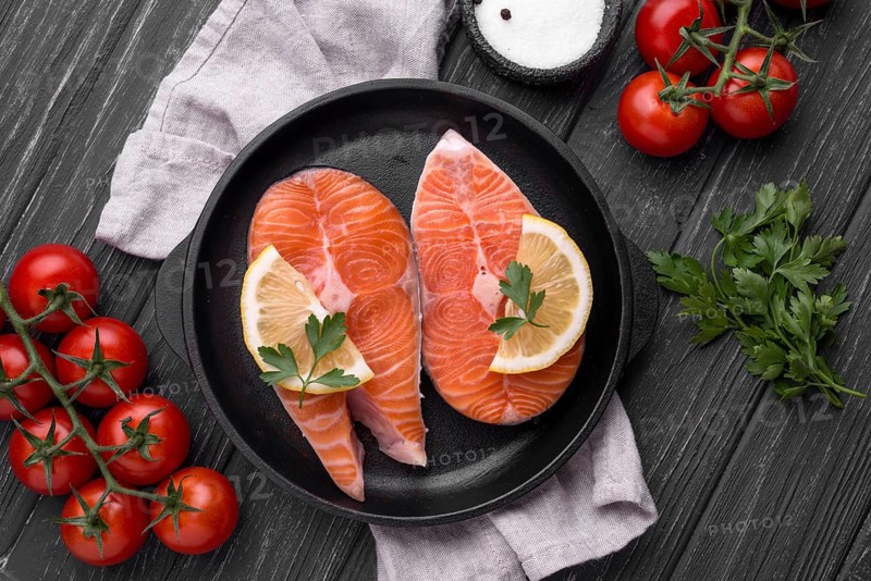 Slices raw red salmon top view