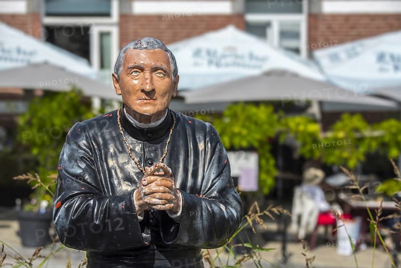 Sculpture of pastor Gerard at the Grotto of St Anthony of Padua in the village Crupet