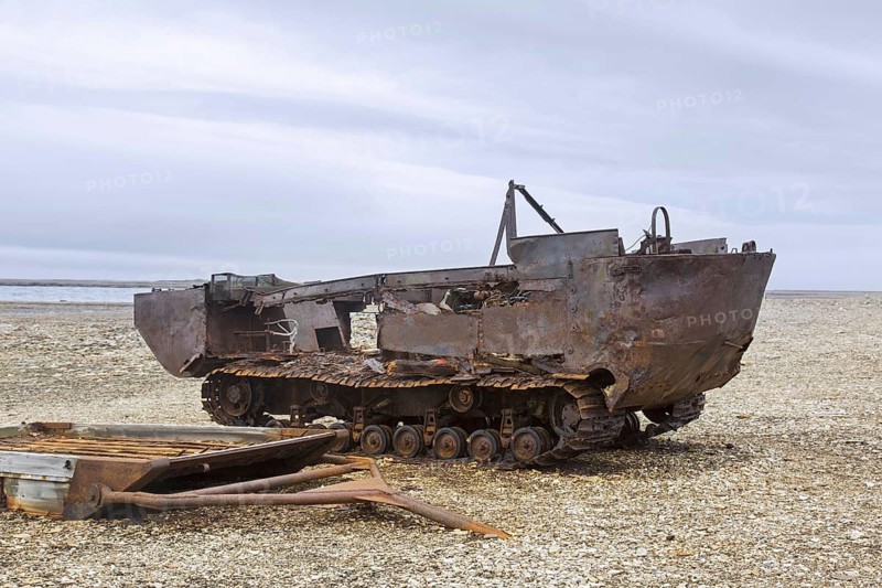 Rusty amphibian vehicle at deserted 1950s Kinnvika Arctic research station