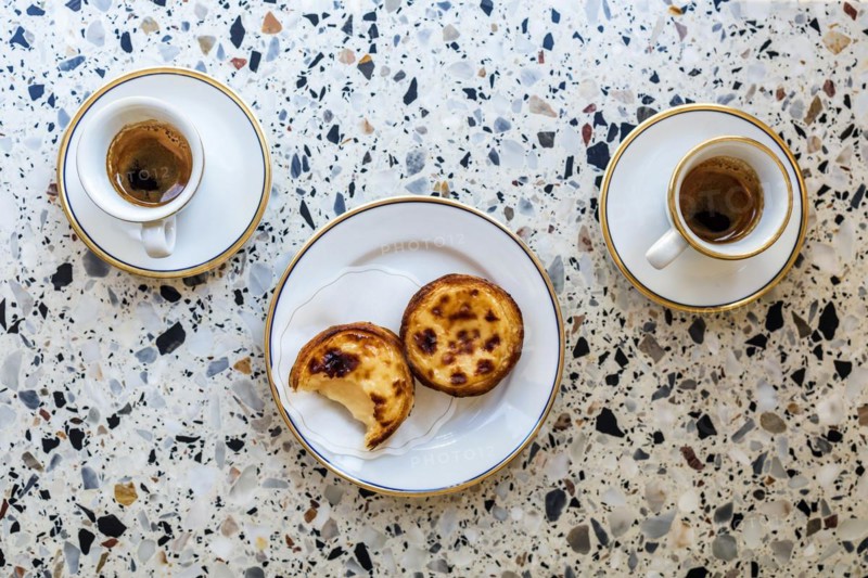 Delicious portuguese pastry named pastel de Belem or pastel de nata typically eaten with expresso coffee