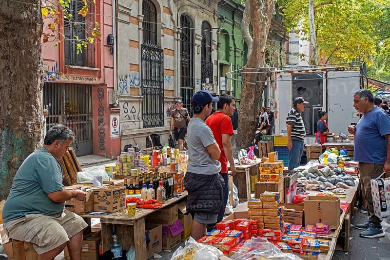 Vendors selling food at Sunday market