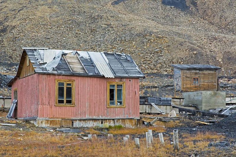 Derelict wooden buildings at Pyramiden