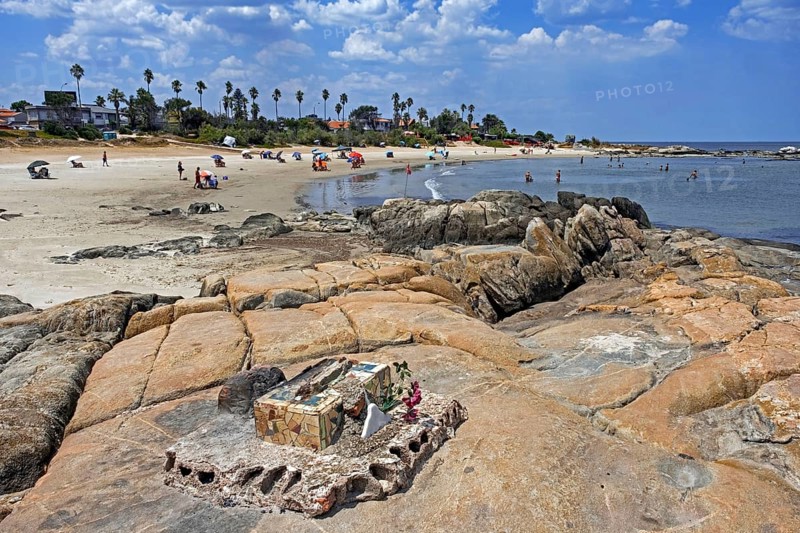 Tourists sunbathing on the Playa Verde beach