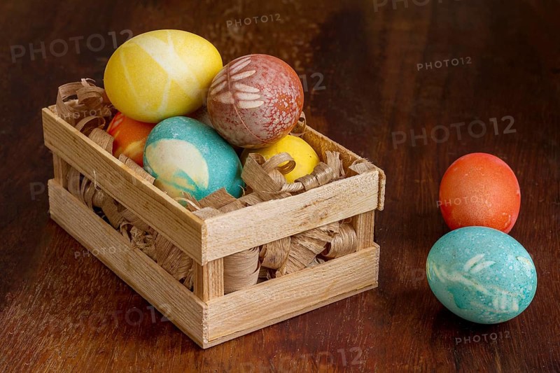 High angle colorful eggs easter wooden crate
