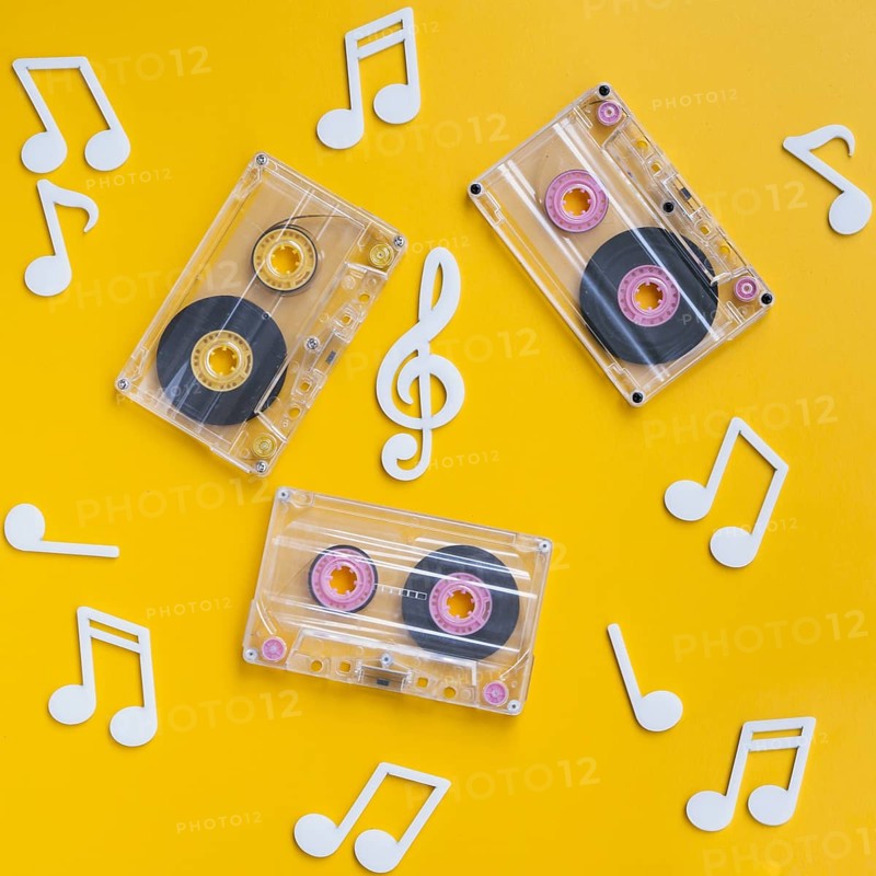 Transparent cassette tapes collection with musical notes around