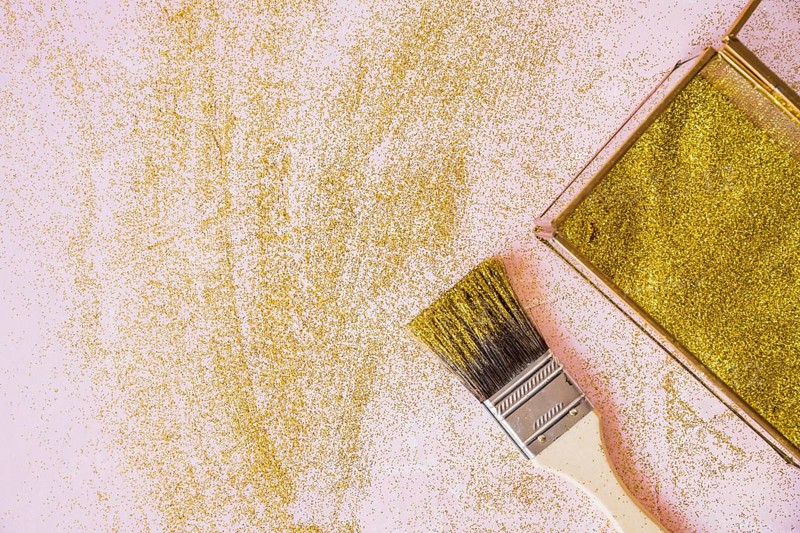 Yellow sequins box with brush