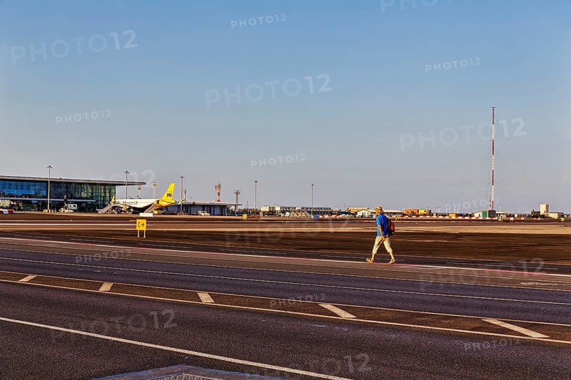 Tourist walking on Winston Churchill Avenue