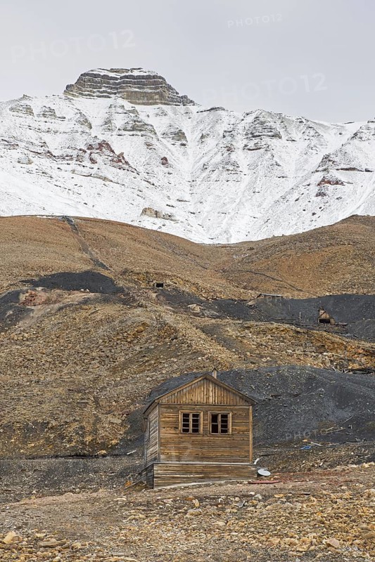Old wooden hut and adits