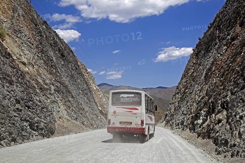 Public transport by bus riding over a mountain pass to Khoy