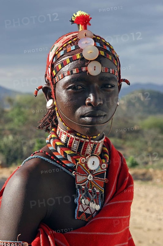 Portrait of Samburu warrior in traditional red dress