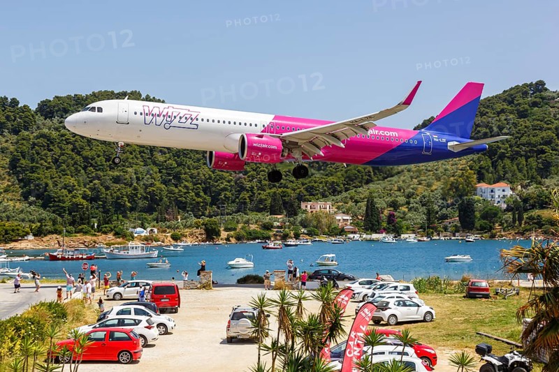 A Wizzair Airbus A321neo aircraft with the registration HA-LZE at Skiathos Airport