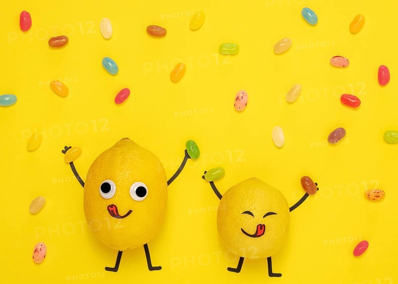 Top view lemons with candy
