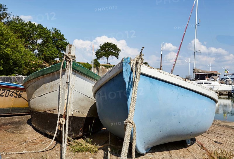 Frog's-eye view of fishing boats in the harbour of Le Chateau-d'Oleron
