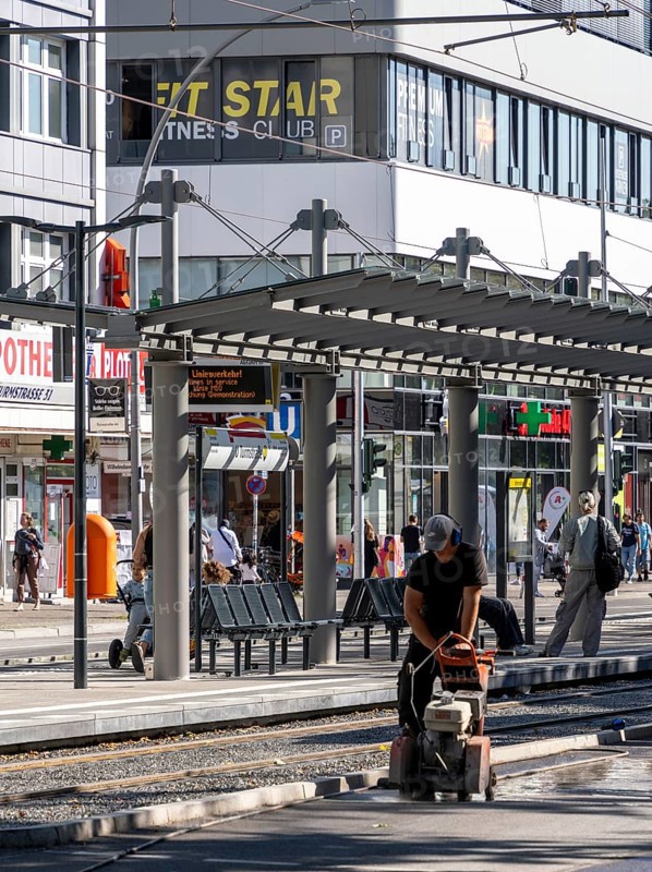 Road construction site next to a tram station