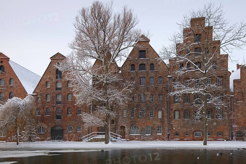 Historic salt warehouses in the snow in winter