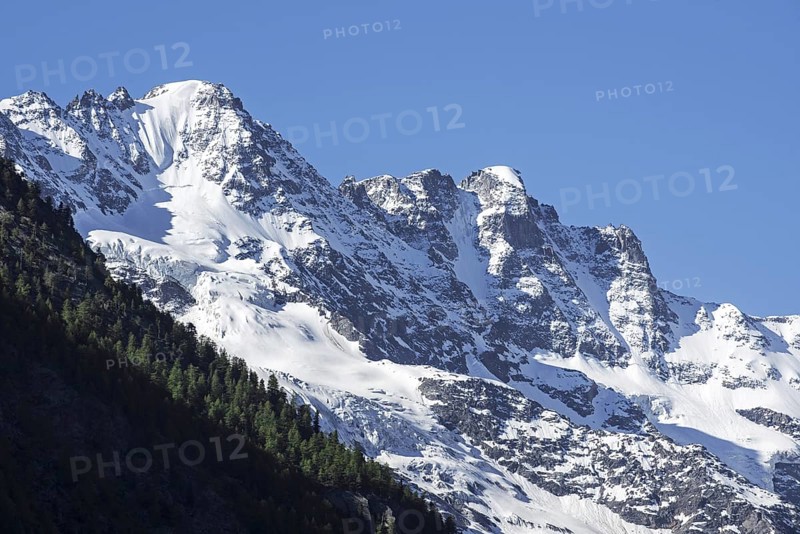 Snow covered mountain Gran Paradiso seen from Cogne in the Graian Alps