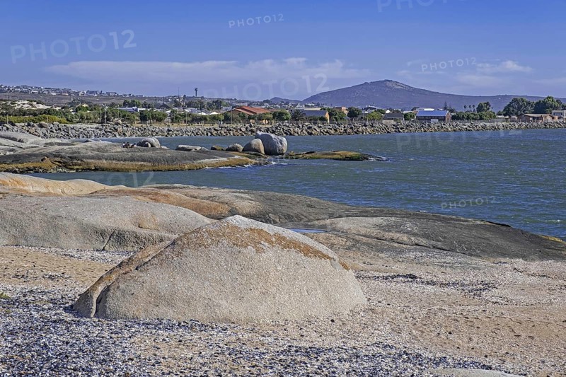 Large granite boulders on beach along the Atlantic Ocean at Langebaan