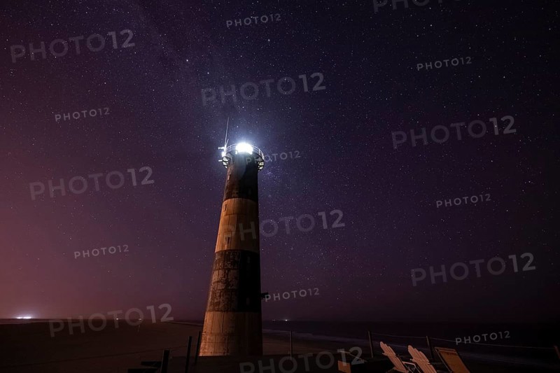 Pelican Point lighthouse with starry sky