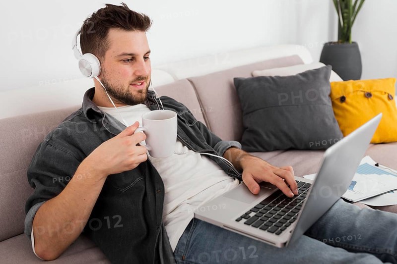 Portrait casual male enjoying work from home