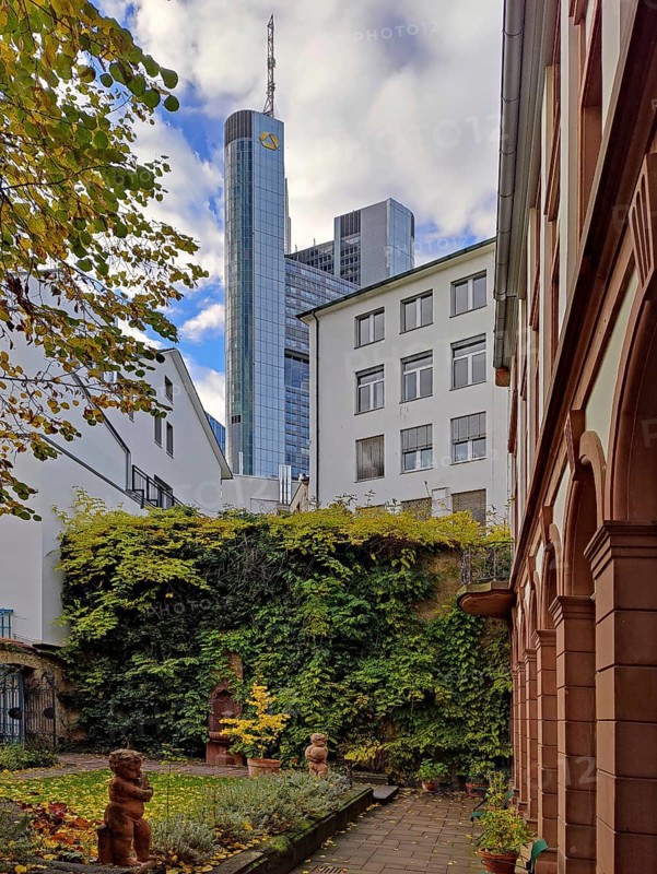 View of the garden of the Goethe House with Commerzbank Tower