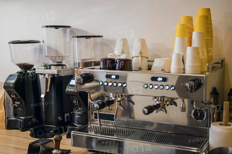 Front view coffee machine with loads cups