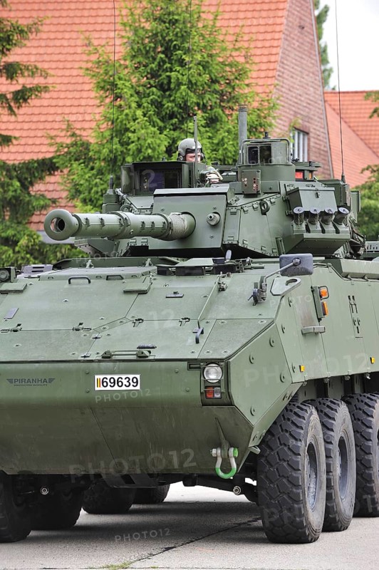 Commander in turret of MOWAG Piranha IIIC armoured fighting vehicle of the Belgian army