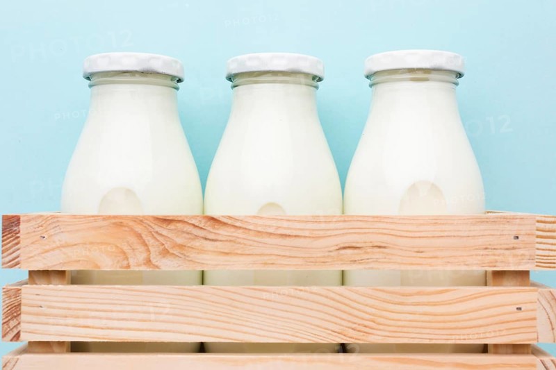 Close up fresh bottles milk ready be served