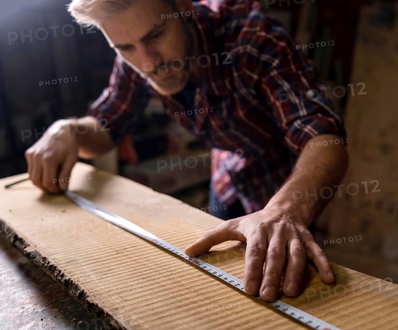 Close up man working with wood 2