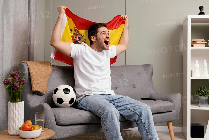 Man watching sport program tv