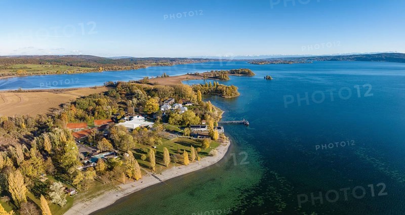 Aerial panorama of the Mettnau peninsula in western Lake Constance with the spa centre
