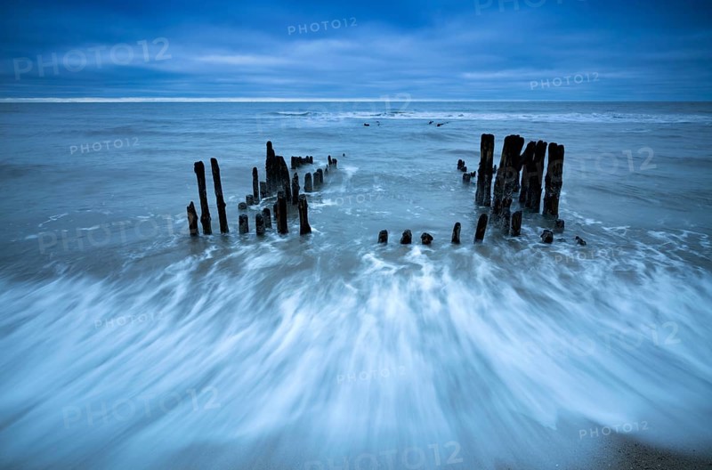 Remains of an old weathered groyne
