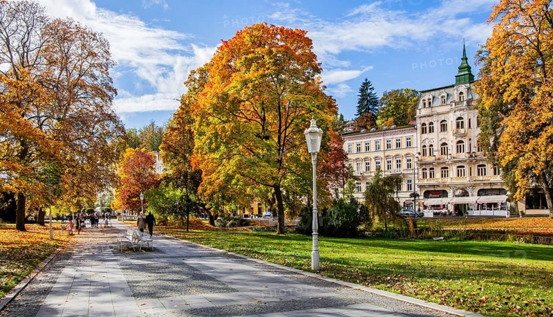 Promenade in autumn spa park