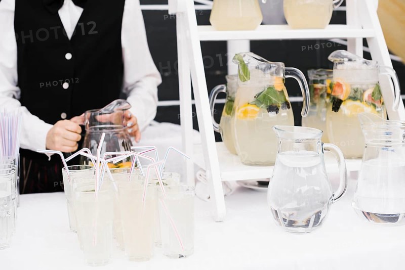 Fresh lemonade with straws table