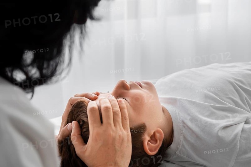 Osteopathist treating child hospital