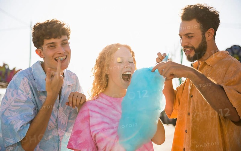 Group friends eating cotton candy