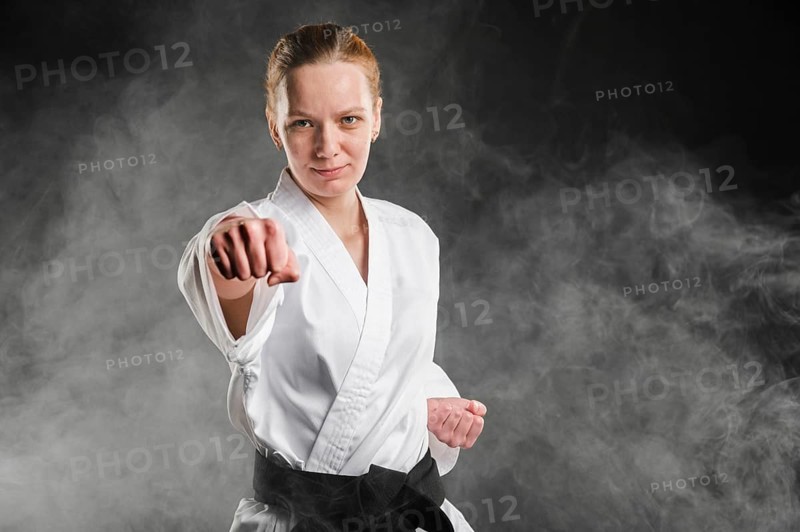 Medium shot woman fighter