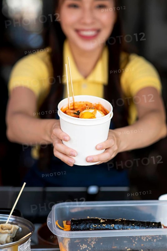 Close up blurry woman with food 2