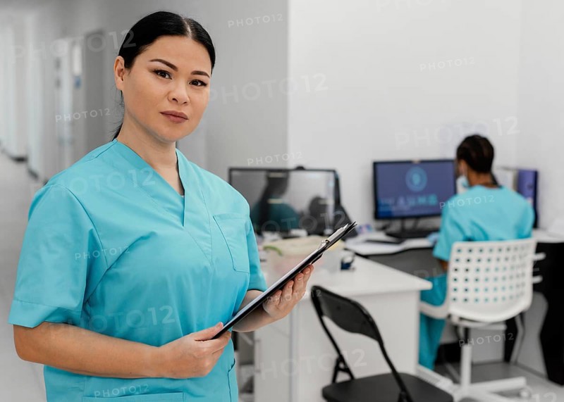 Medium shot health workers indoors