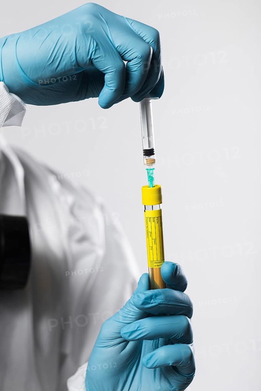 Close up person preparing medical treatment