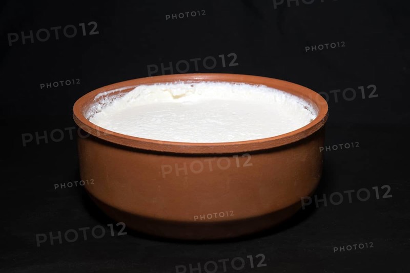 Original Turkish kaymakli yoghurt matured in a clay bowl