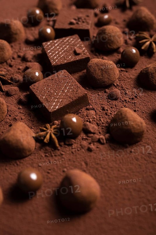 Close up chocolate waffles truffles cocoa powder