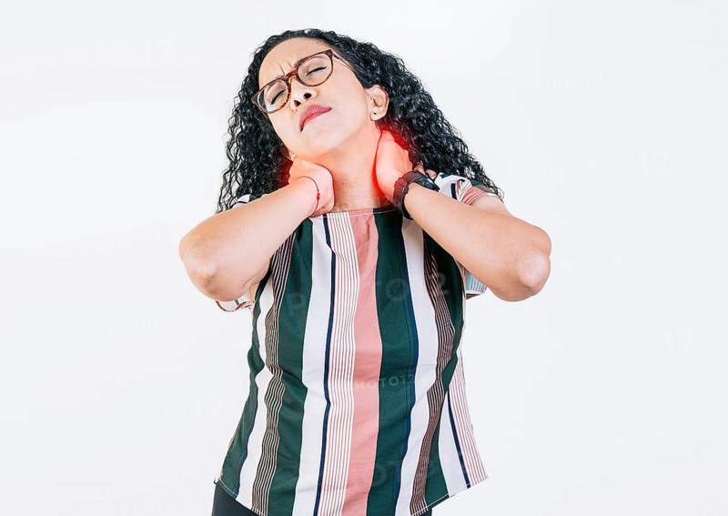 People with neck tension isolated. Neck pain and stress concept. Afro girl suffering with neck pain isolated
