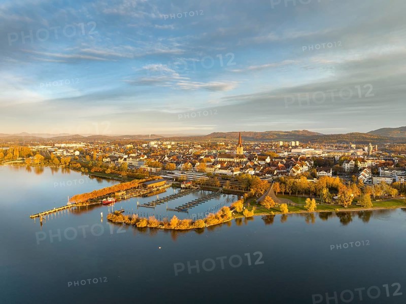 Aerial view of the city of Radolfzell on Lake Constance in autumn vegetation with the Waeschbruckhafen