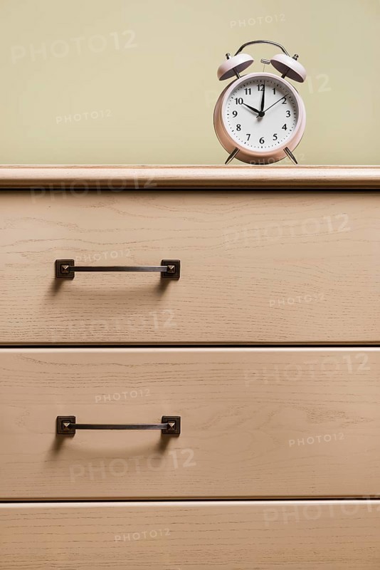 Alarm clock wooden closed drawer
