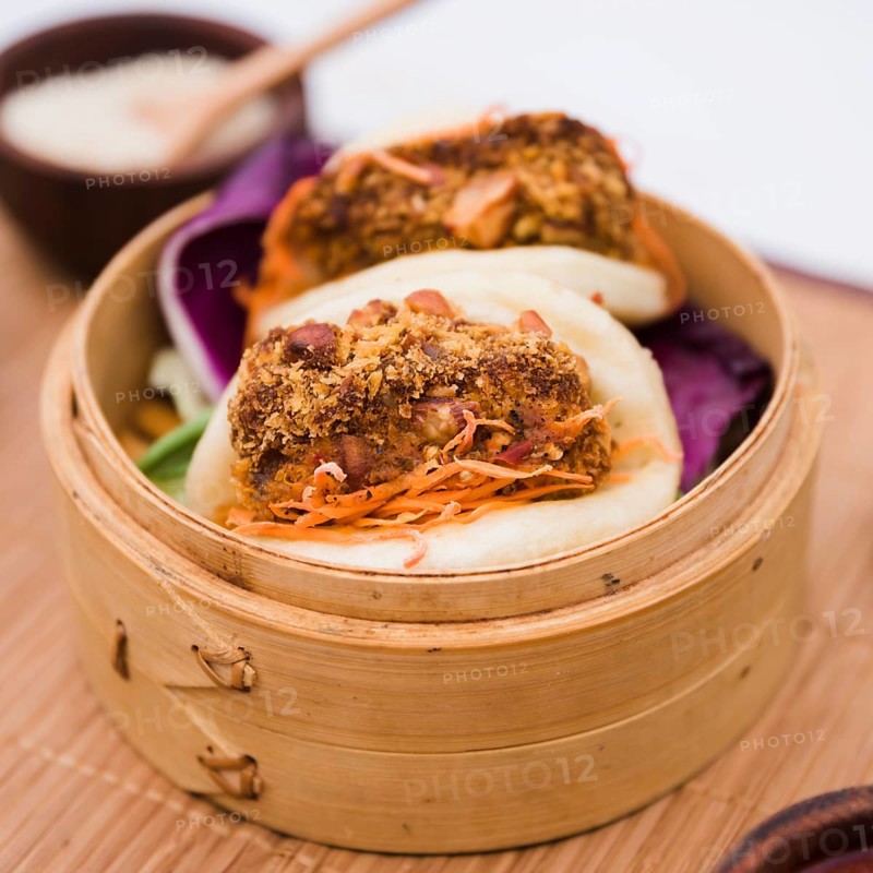Close up traditional food gua bao bamboo steamer