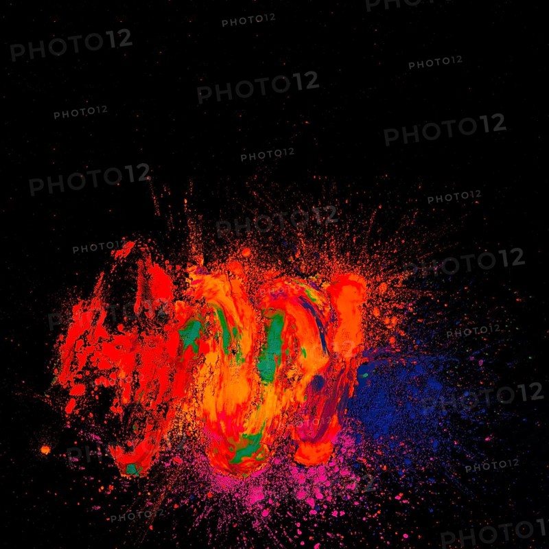 High angle view bright holi colored front black background